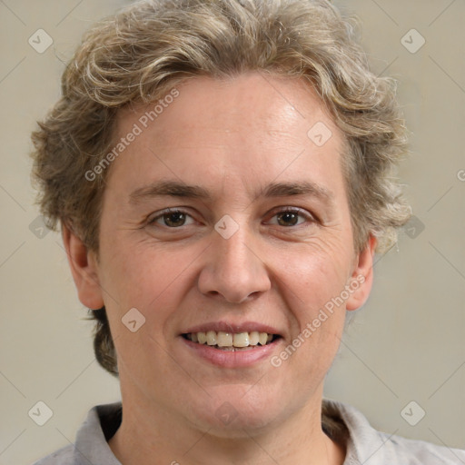 Joyful white adult male with short  brown hair and grey eyes