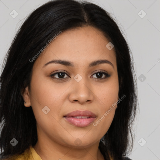 Joyful latino young-adult female with long  brown hair and brown eyes