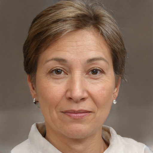 Joyful white middle-aged female with short  brown hair and brown eyes