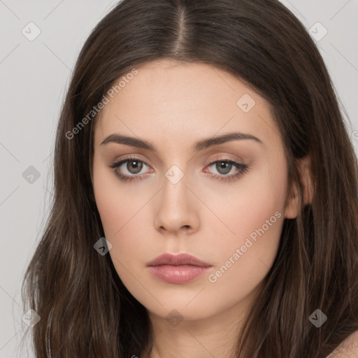 Neutral white young-adult female with long  brown hair and brown eyes