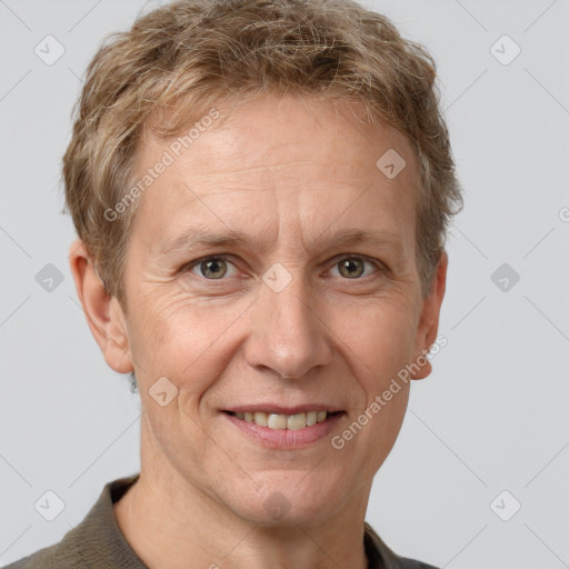 Joyful white adult male with short  brown hair and grey eyes