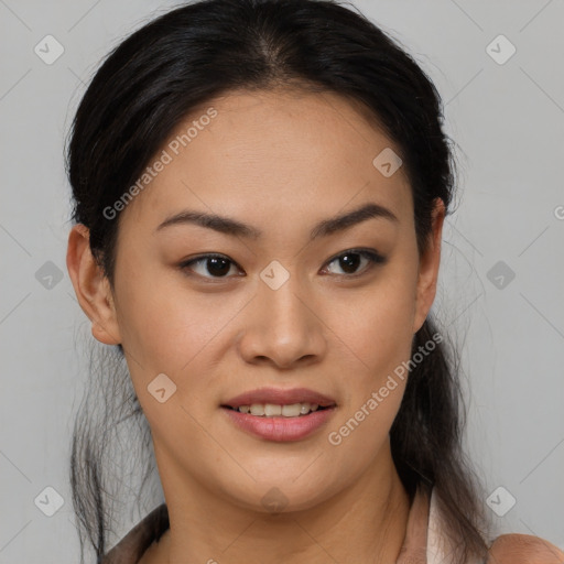 Joyful latino young-adult female with medium  brown hair and brown eyes