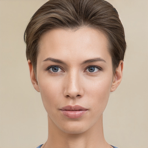 Neutral white young-adult female with short  brown hair and brown eyes