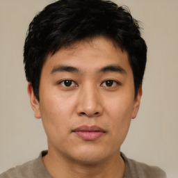 Neutral asian young-adult male with short  brown hair and brown eyes