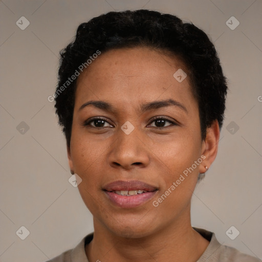 Joyful black young-adult female with short  black hair and brown eyes