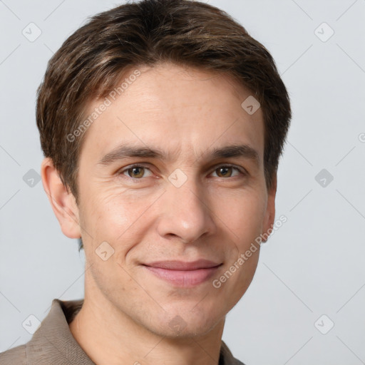 Joyful white adult male with short  brown hair and grey eyes