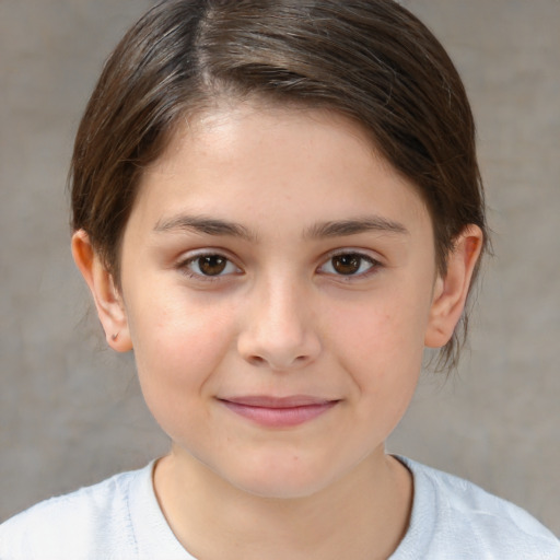 Joyful white child female with short  brown hair and brown eyes