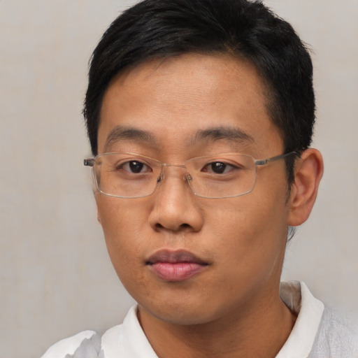 Neutral asian young-adult male with short  black hair and brown eyes