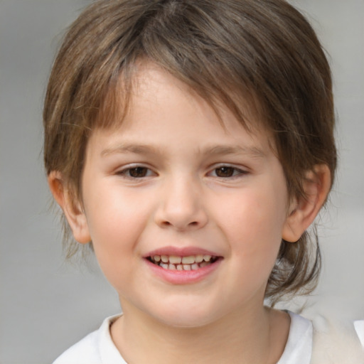 Joyful white child female with medium  brown hair and brown eyes