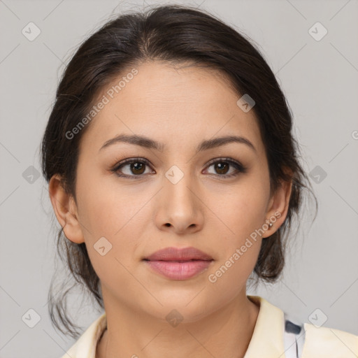 Joyful latino young-adult female with medium  brown hair and brown eyes