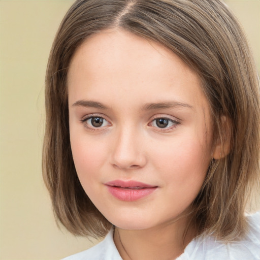 Joyful white child female with medium  brown hair and brown eyes