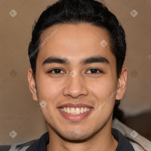 Joyful latino young-adult male with short  black hair and brown eyes