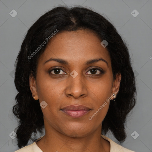 Joyful black young-adult female with medium  brown hair and brown eyes