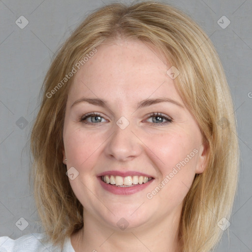 Joyful white young-adult female with medium  brown hair and blue eyes