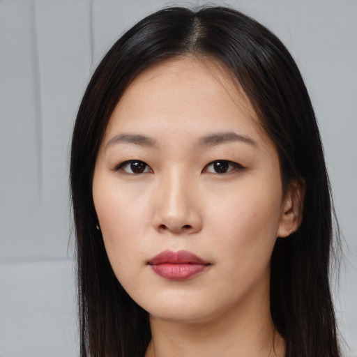 Neutral white young-adult female with long  black hair and brown eyes