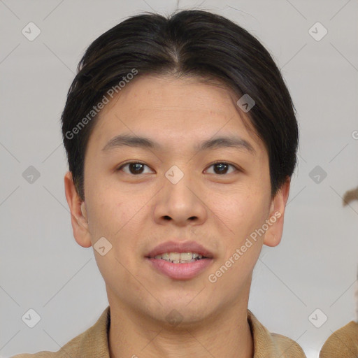 Joyful asian young-adult male with short  brown hair and brown eyes