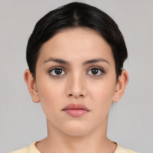 Neutral white young-adult female with short  black hair and brown eyes