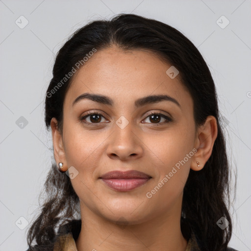 Joyful latino young-adult female with medium  brown hair and brown eyes