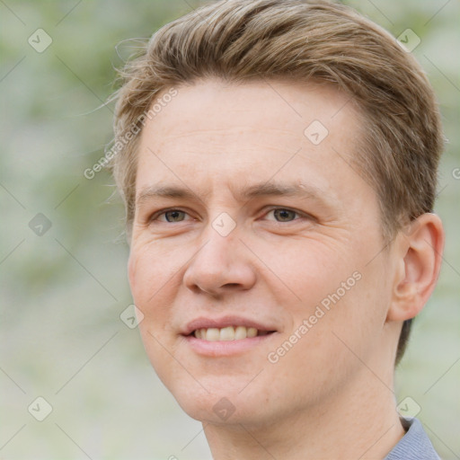 Joyful white adult male with short  brown hair and brown eyes