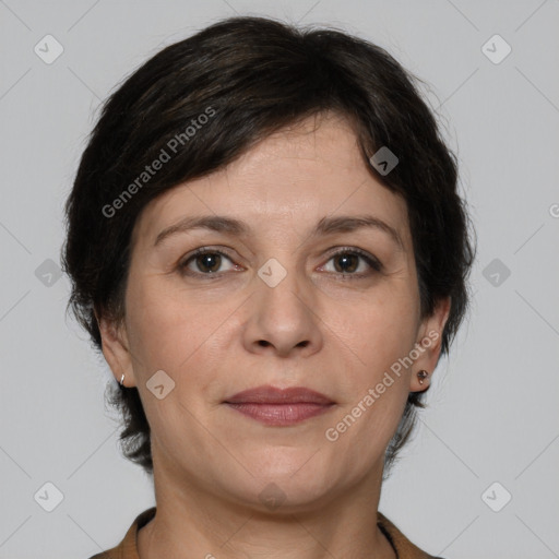 Joyful white adult female with medium  brown hair and grey eyes