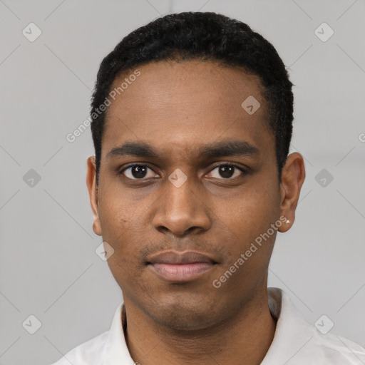 Neutral latino young-adult male with short  black hair and brown eyes