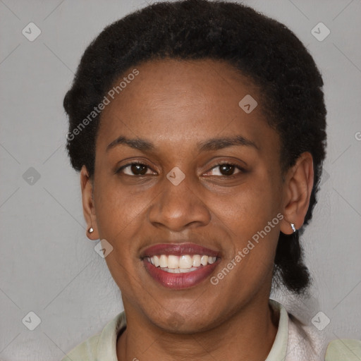 Joyful latino young-adult female with short  black hair and brown eyes