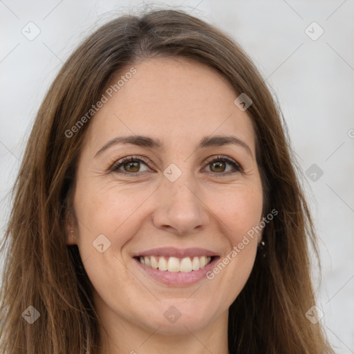 Joyful white young-adult female with long  brown hair and green eyes