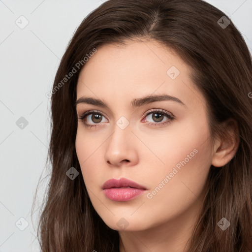 Neutral white young-adult female with long  brown hair and brown eyes