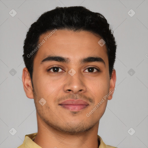 Joyful latino young-adult male with short  brown hair and brown eyes