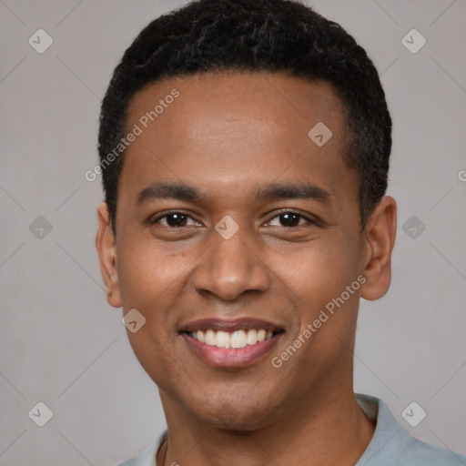 Joyful black young-adult male with short  black hair and brown eyes