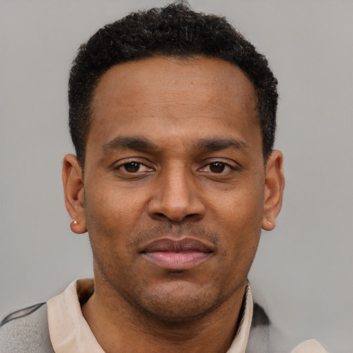 Neutral latino young-adult male with short  brown hair and brown eyes