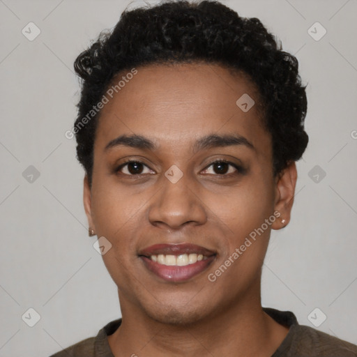 Joyful latino young-adult female with short  black hair and brown eyes