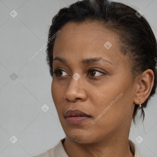 Neutral black adult female with short  brown hair and brown eyes