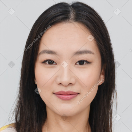 Joyful asian young-adult female with long  brown hair and brown eyes