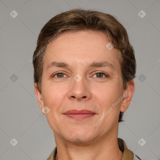 Joyful white adult female with short  brown hair and grey eyes