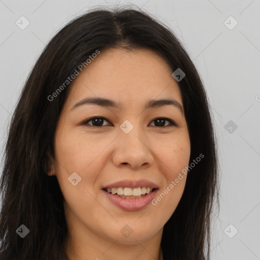 Joyful latino young-adult female with long  brown hair and brown eyes