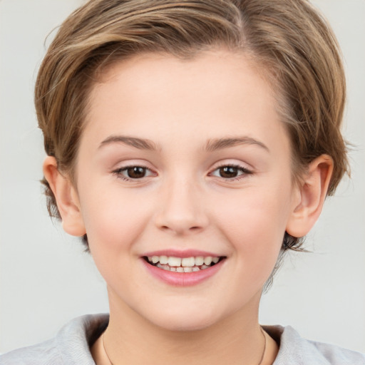 Joyful white child female with medium  brown hair and grey eyes