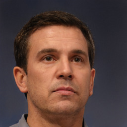 Neutral white adult male with short  brown hair and brown eyes