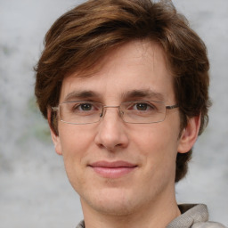 Joyful white adult male with short  brown hair and grey eyes