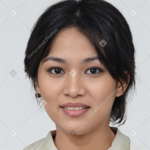 Joyful asian young-adult female with medium  brown hair and brown eyes