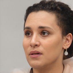 Neutral black young-adult female with short  brown hair and brown eyes