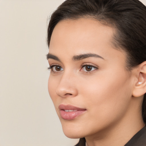 Neutral white young-adult female with medium  brown hair and brown eyes