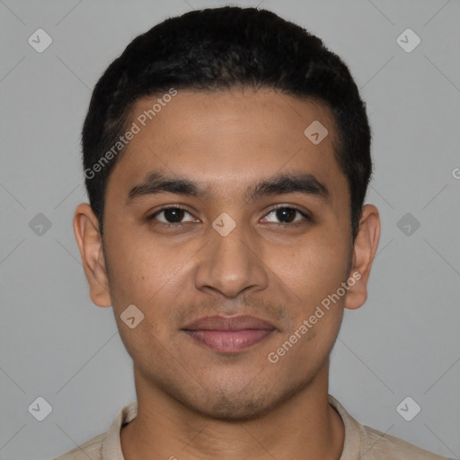 Joyful latino young-adult male with short  black hair and brown eyes