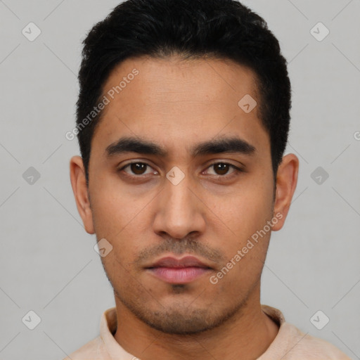 Neutral latino young-adult male with short  black hair and brown eyes