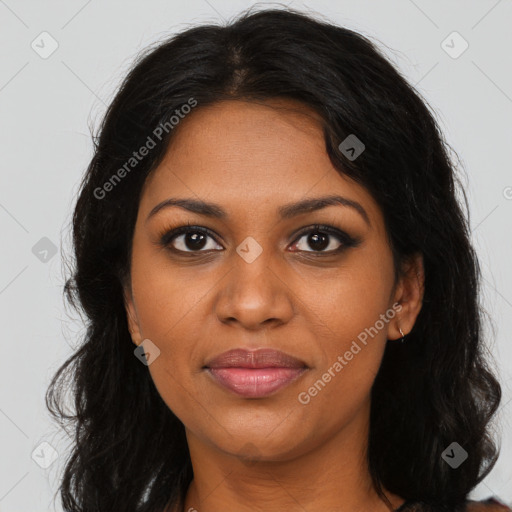 Joyful black young-adult female with long  brown hair and brown eyes