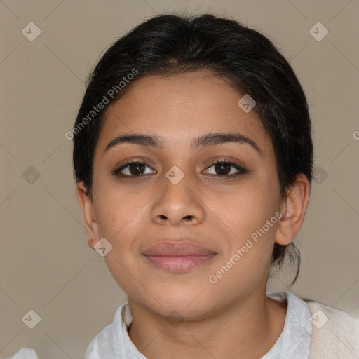 Joyful latino young-adult female with short  brown hair and brown eyes