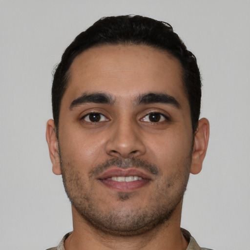 Neutral latino young-adult male with short  black hair and brown eyes