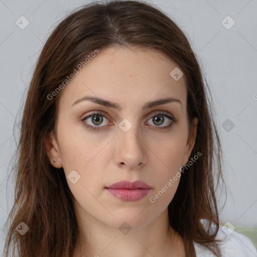 Neutral white young-adult female with long  brown hair and brown eyes