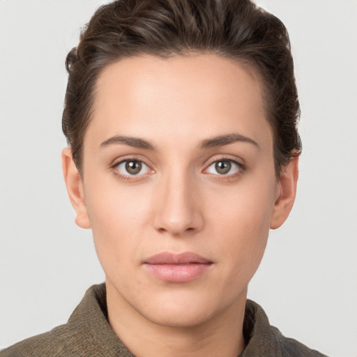 Neutral white young-adult female with short  brown hair and brown eyes