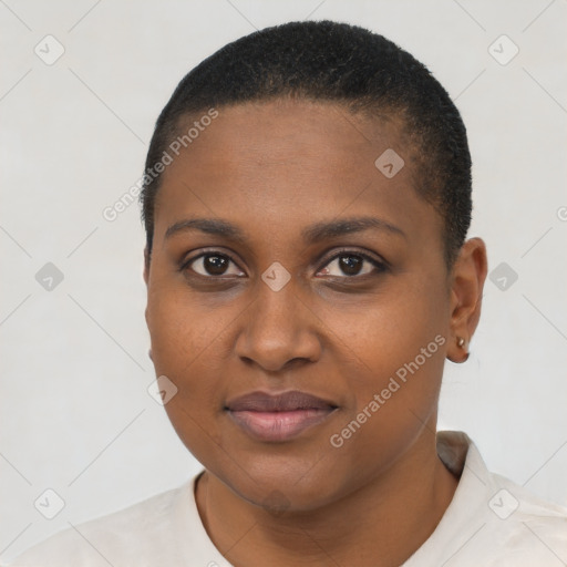 Joyful black young-adult female with short  black hair and brown eyes